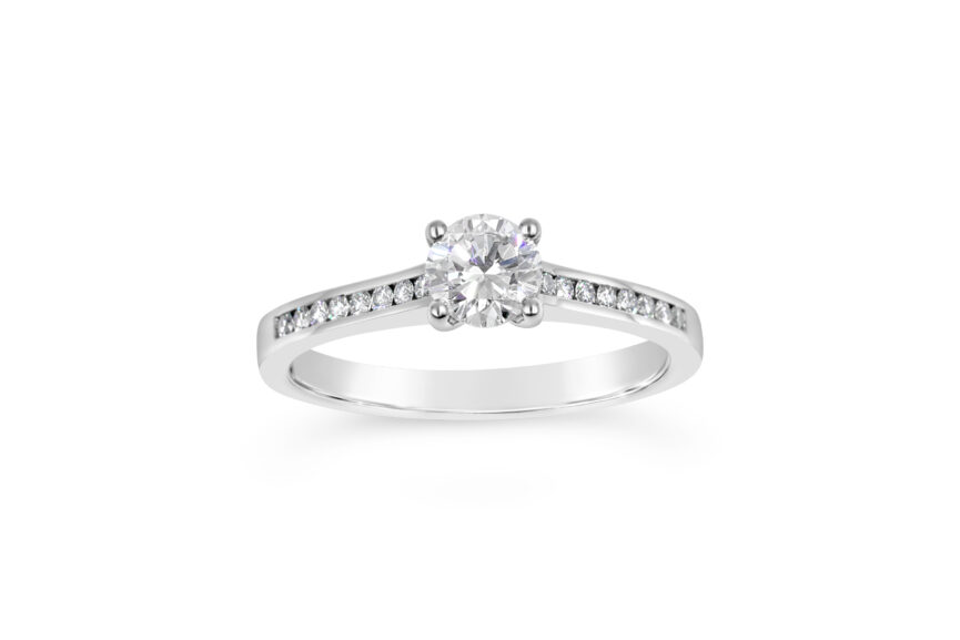 ROUND SINGLE STONE CHANNEL SHOULDERS RING