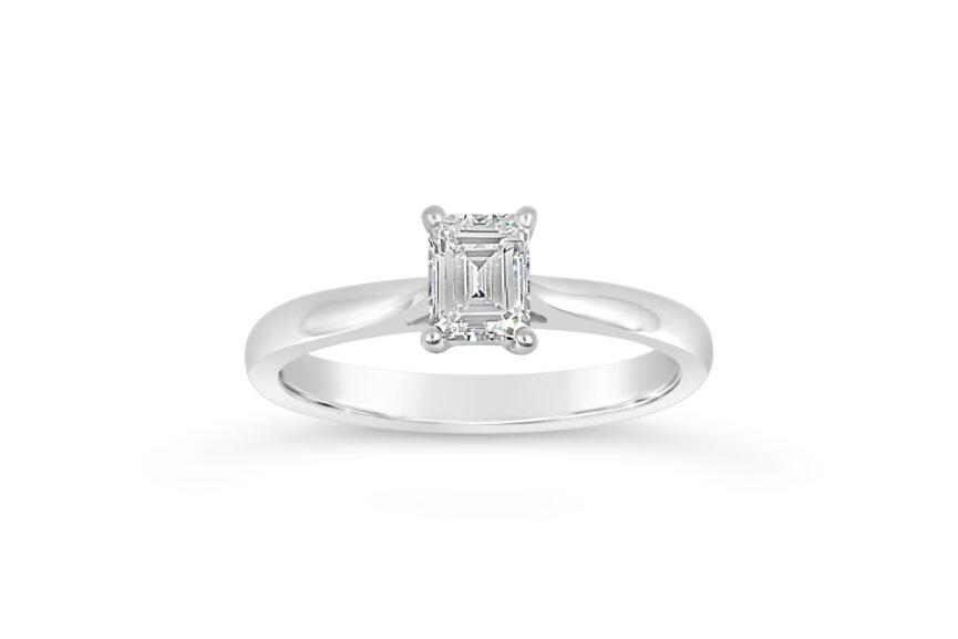 U SHAPE EMERALD CUT SINGLE STONE RING