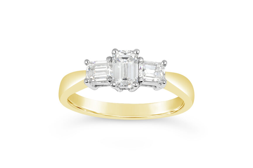 3 STONE EMERALD CUT DIAMOND RING