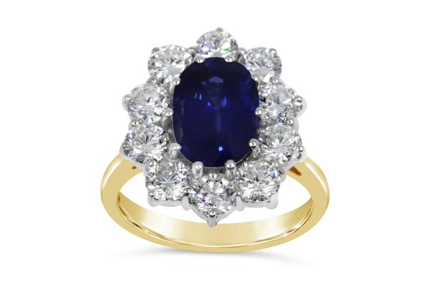OVAL SAPPHIRE + DIAMOND CLUSTER RING