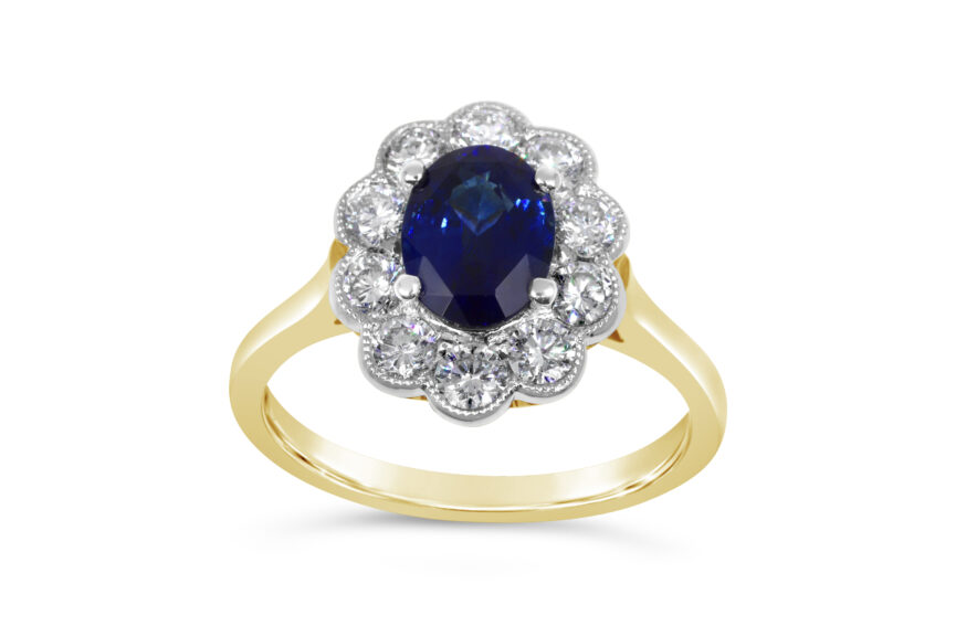 SAPPHIRE OVAL 10 DIAMOND CLUSTER RING