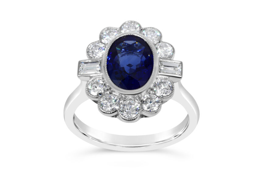 SAPPHIRE OVAL 12 DIAMOND CLUSTER RING