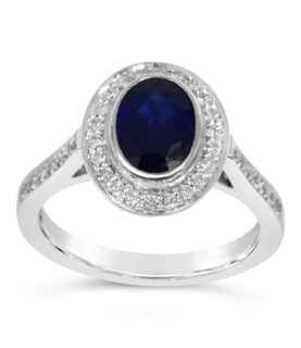 OVAL SAPPHIRE SINGLE STONE DIAMOND SURROUND RING